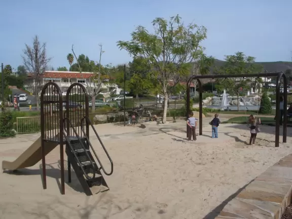 A peaceful place to look at the fountains and lively statues, sit in the sun by the playground, and grab an icecream.