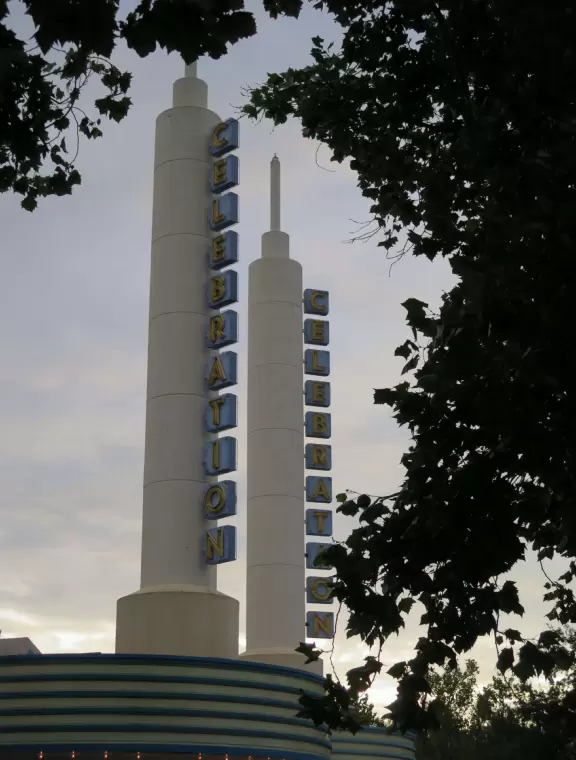 Walk along Celebration Blvd at sunset, enjoying the Art Deco buildings.