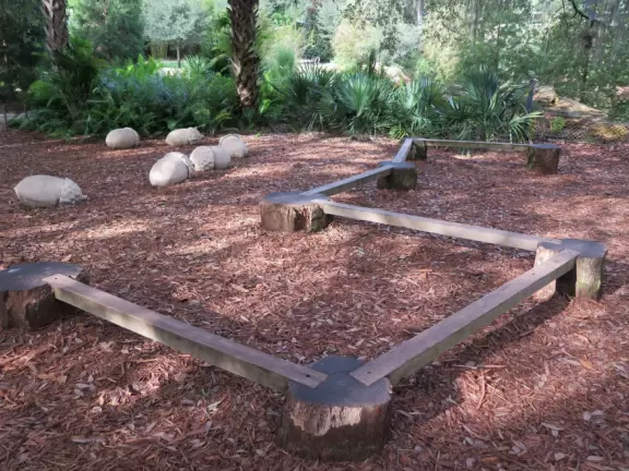 World-class garden with pink marble tower on a pond, giant lily pads, views from up high, and a magical wooded children's area.