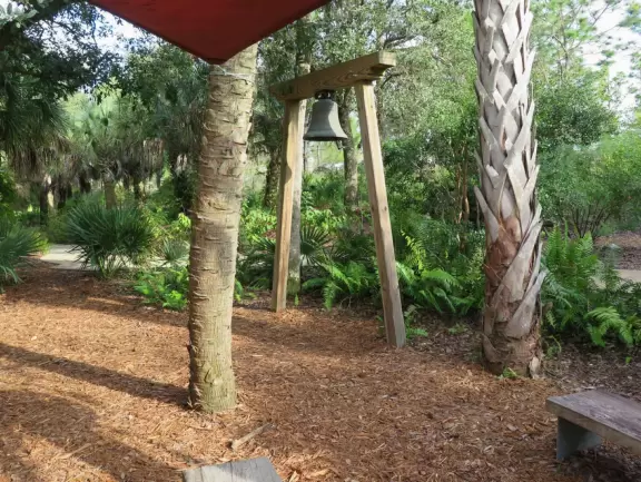 World-class garden with pink marble tower on a pond, giant lily pads, views from up high, and a magical wooded children's area.