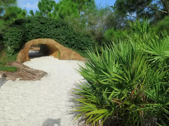 World-class garden with pink marble tower on a pond, giant lily pads, views from up high, and a magical wooded children's area.