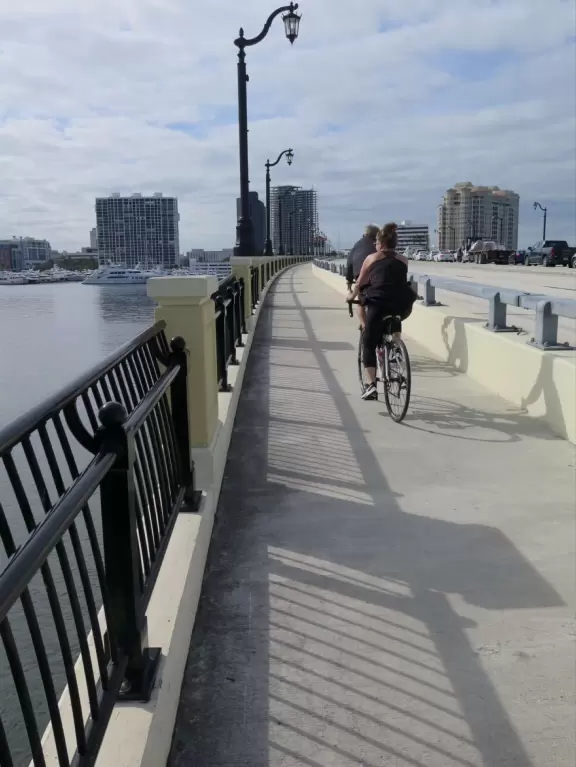 Pretty park at the beginning of the North Lake Trail, near the Flagler Memorial Bridge. Walk under the bridge to check out Royal Poinciana Plaza.