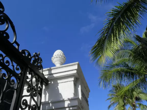 Lovely walk past mansions, flowers, statues, and lanterns.