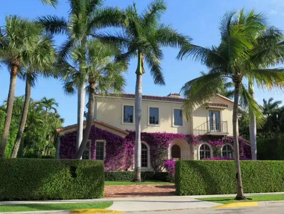 Lovely walk past mansions, flowers, statues, and lanterns.