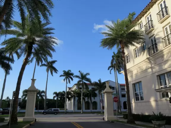 A tropical wonderland of palms, ferns, bromeliads, fountains, sculptures, rocks, ironwork gates, and pergolas, with the delightful scent of flowers filling the air.
