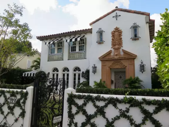 Lovely walk past mansions, flowers, statues, and lanterns.