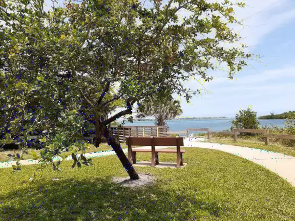 Beautiful park with wooden boardwalks jutting into the intracoastal, nature trail, and beach.