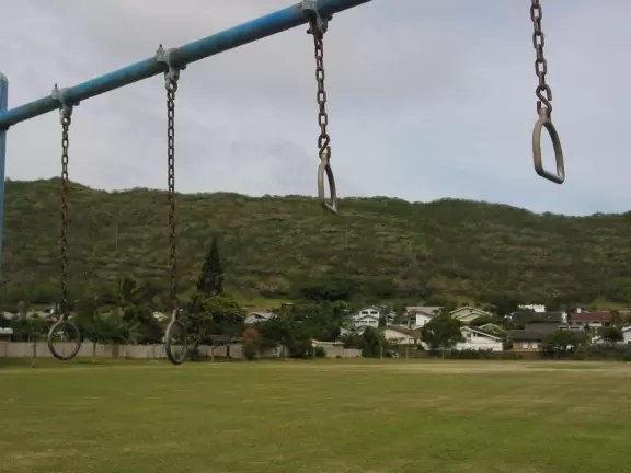 A simple playground surrounded by nice mountains.