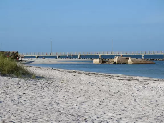 Beautiful beach, long pier, and mortar battery that used to defend the fort.
