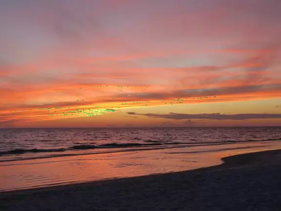 White sand beach with glorious sunsets. You can grab food at the cafes on Pine Ave and have a picnic at the beach.