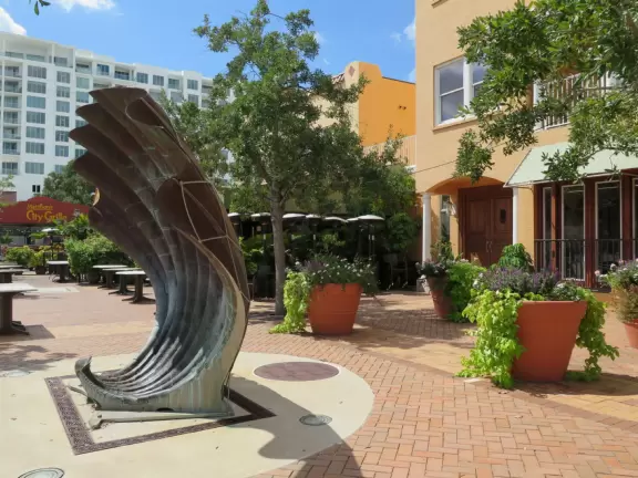 Shady street with many cafes.