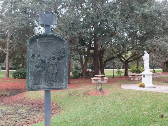 Beautiful modern basilica with gift shop, water lilies, stained glass, rose window, organ and exceptional choir.
