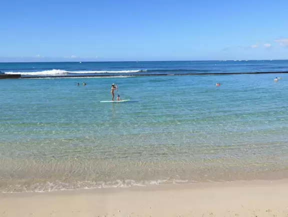 A rock wall protects this area of Waikiki Beach from waves, making it a swimming pool right there at the beach! Also called Kuhio Beach or Kuhio Ponds. Near Waikiki Wall.