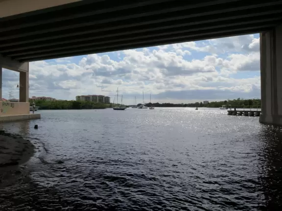 A happening spot with a sunken amphitheater by the water where kids can run in a splash pad and fountains are lit up at night.&nbsp; BurgerFi, Subculture Coffee, and a few restaurants.