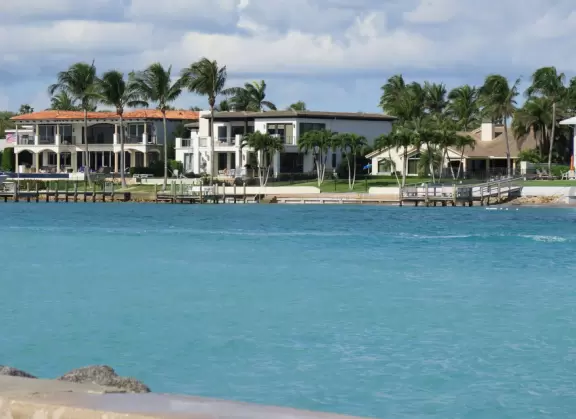 Beach where fishermen hang out on the jetty and surfers come to ride the waves at Jupiter Inlet.