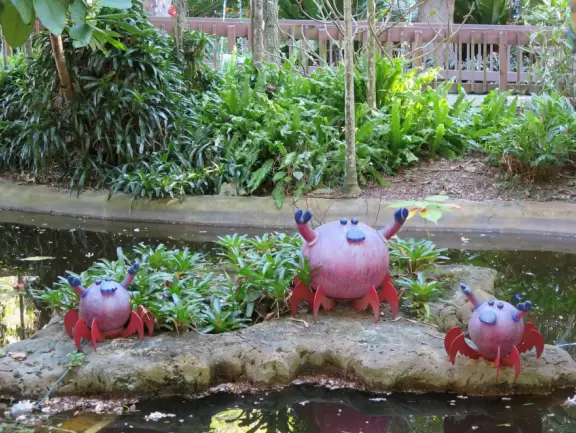 Tropical botanical garden with huge magnificent trees and animal sanctuary.