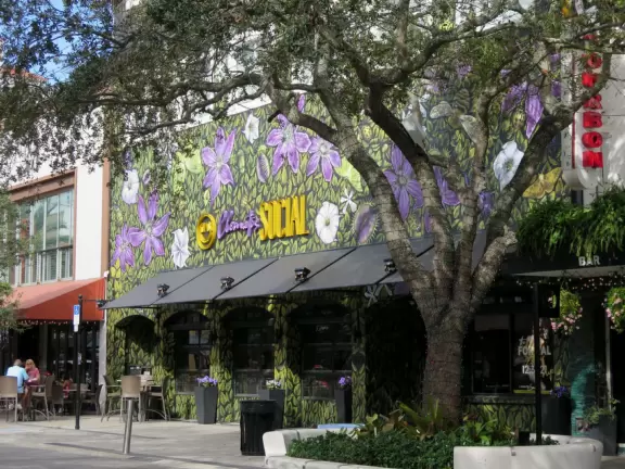 Main strip of West Palm Beach, with colorful and inviting architecture and decorations.