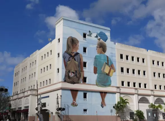 Main strip of West Palm Beach, with colorful and inviting architecture and decorations.