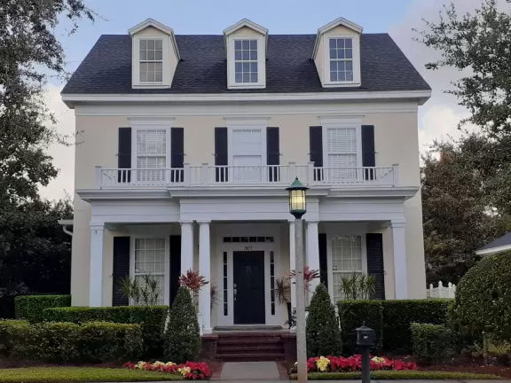 Walk past lake with cypress trees, and down three culdesacs with mansions.