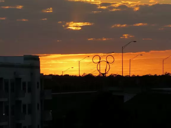 Walk along Celebration Blvd at sunset, enjoying the Art Deco buildings.