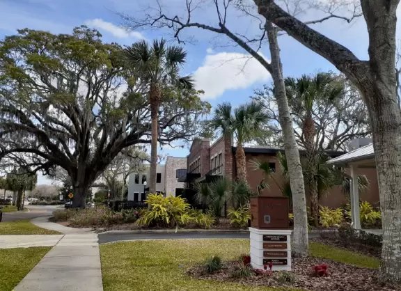 A cute main strip with restaurants, a bike path, and a splash pad.