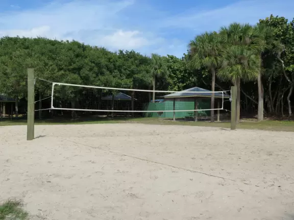 Exposed beach with gorgeous sea grape forest, sand volleyball courts, and basketball courts- a happening scene! Plus a concession snack area with a huge grass shack for shade.