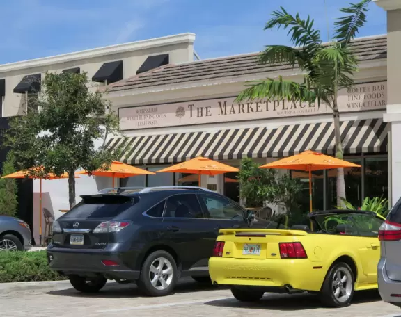 Small beach town with coffee shops, cafes with live music, magical banyan tree walk, hilly walks, beach with sea oats and vibrant turquoise water, and white-sand intracoastal beach.