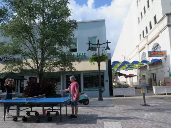 Main strip of West Palm Beach, with colorful and inviting architecture and decorations.
