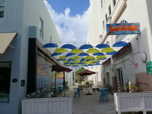 Main strip of West Palm Beach, with colorful and inviting architecture and decorations.