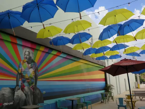 Main strip of West Palm Beach, with colorful and inviting architecture and decorations.