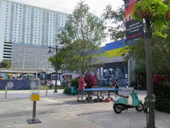 Main strip of West Palm Beach, with colorful and inviting architecture and decorations.