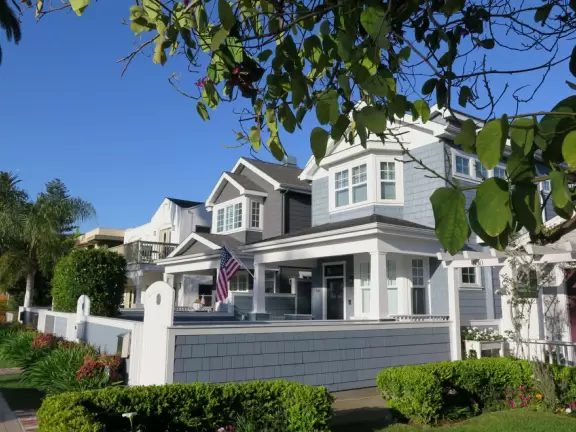 A walk among tropical trees and flowers, and the sweetest houses.