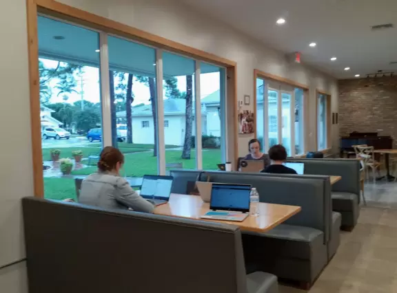 Small beach town with coffee shops, cafes with live music, magical banyan tree walk, hilly walks, beach with sea oats and vibrant turquoise water, and white-sand intracoastal beach.