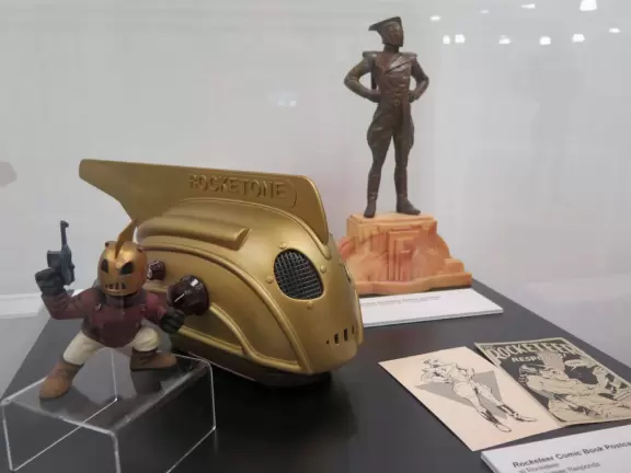Costumes from movies, comic books from days of old, and items from favorite shows, all in a spacious museum with high ceilings and places to rest.