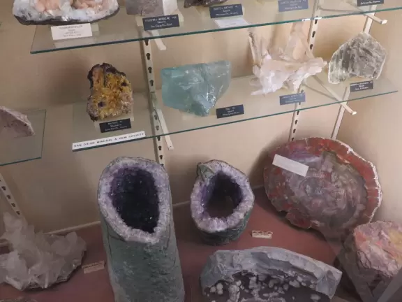 Special area of Balboa Park with adobe buildings, mesquite trees, and brightly colored tiles on the ground. Heart sculpture, and SD Gem Museum. Plus, the wonderful carousel!