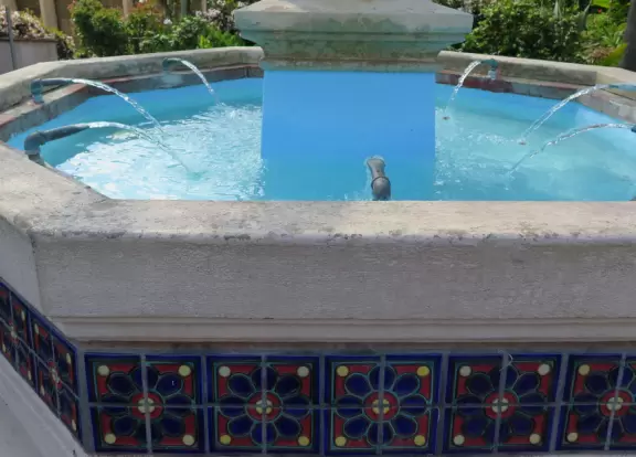 Special area of Balboa Park with adobe buildings, mesquite trees, and brightly colored tiles on the ground. Heart sculpture, and SD Gem Museum. Plus, the wonderful carousel!