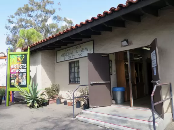 Special area of Balboa Park with adobe buildings, mesquite trees, and brightly colored tiles on the ground. Heart sculpture, and SD Gem Museum. Plus, the wonderful carousel!