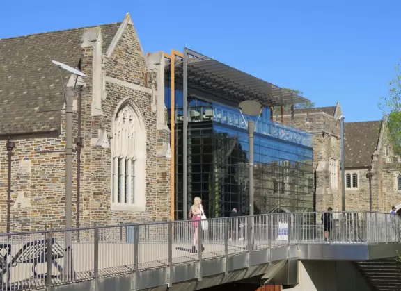 Gorgeous Gothic architecture, impressive chapel, and cute patios under leafy trees.