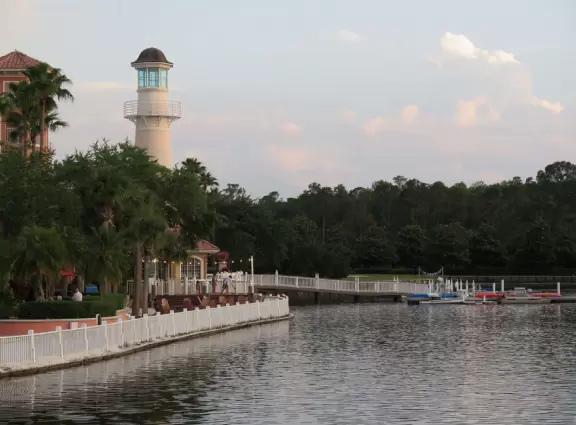 Gorgeous pool areas with splash pad and water cannons, lit up beautifully at night.