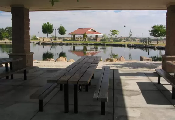 Pretty area with manmade lake and nice wooden playground.