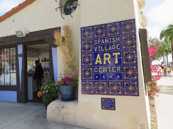 Special area of Balboa Park with adobe buildings, mesquite trees, and brightly colored tiles on the ground. Heart sculpture, and SD Gem Museum. Plus, the wonderful carousel!