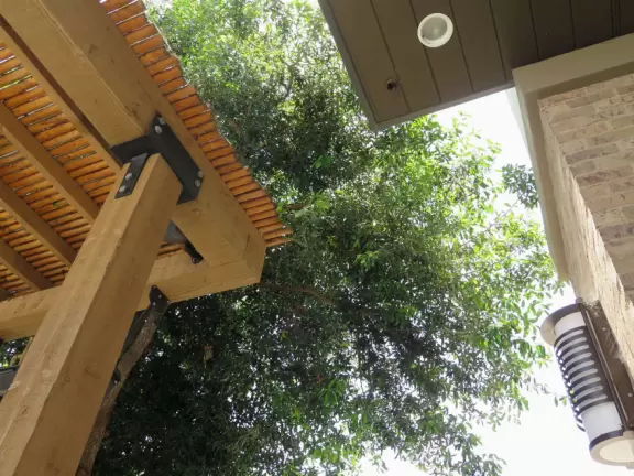 Modern shopping plaza with cafe balconies up high with a view.