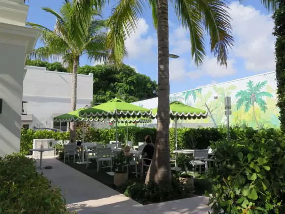 Main strip of West Palm Beach, with colorful and inviting architecture and decorations.