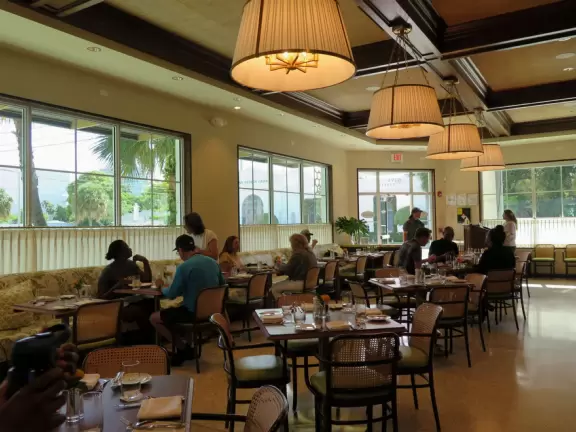 Main strip of West Palm Beach, with colorful and inviting architecture and decorations.