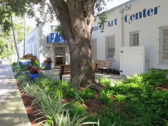 Popular park with big trees, a pond with ducks, and a fun playground!