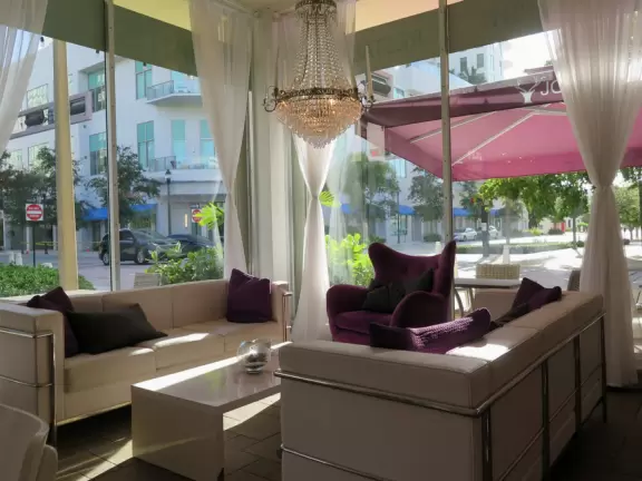 Main strip of West Palm Beach, with colorful and inviting architecture and decorations.