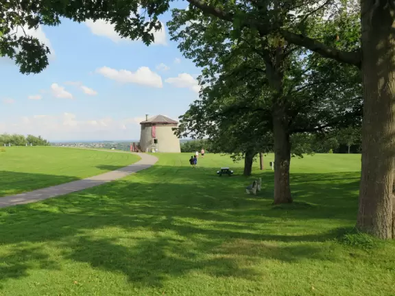Sweet little spot to sit, with flower beds and benches.