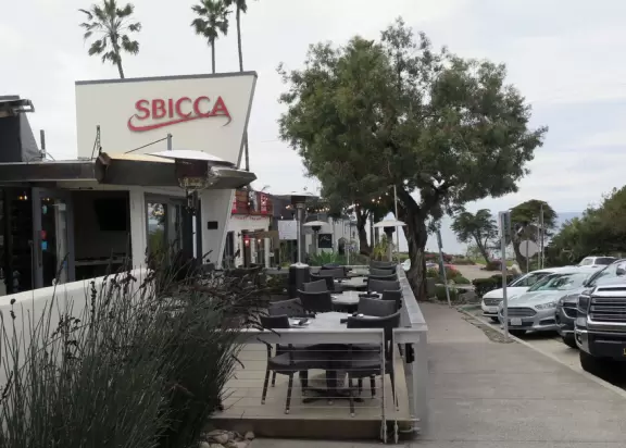Cute street to walk along, with cafes and shops, a few blocks back from the beach.