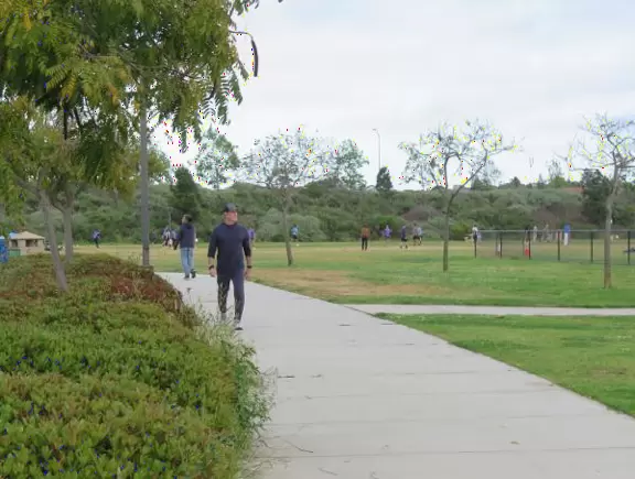 Loop walking path popular with residents, plus a playground.