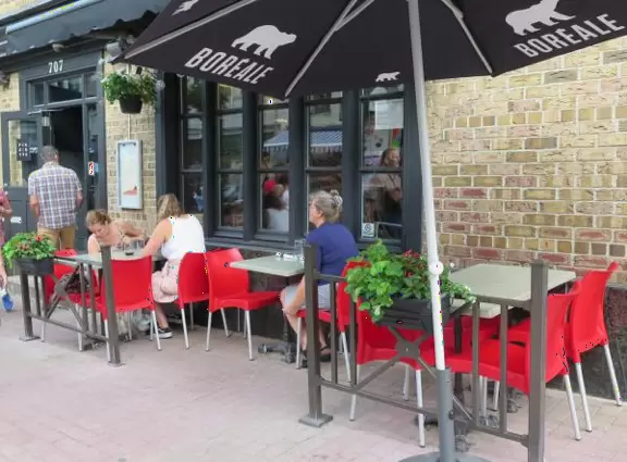 Cute street with cafes and markets, with more locals than tourists. Buzzing nightlife.